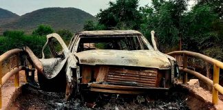 Hallan dos cadáveres calcinados dentro de Suburban blindada, estallada con explosivo improvisado terrestre en Las Bateas