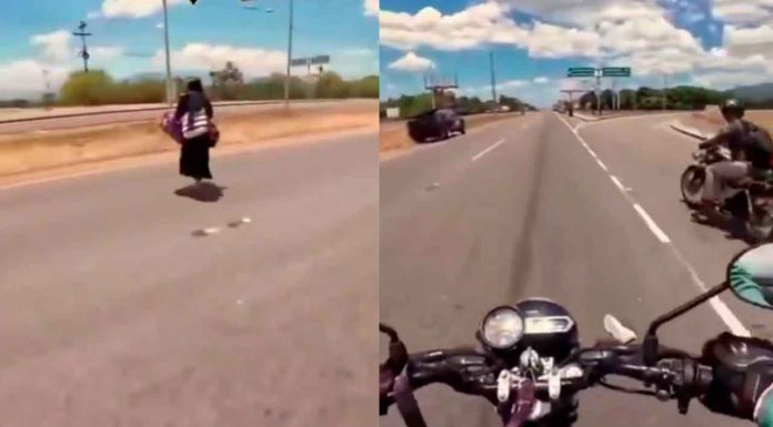 #Video | Mujer cruza avenida principal sin importar la alta velocidad en que circulaban los vehículos