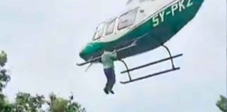 #Video | Hombre cumple su sueño de volar aferrado a un helicóptero y es arrestado #Internacional