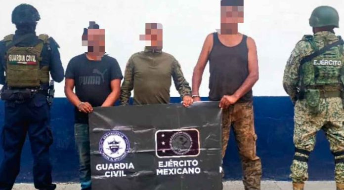 Detenidos tres hombres armados, aseguran droga y cartuchos en Apatzingán