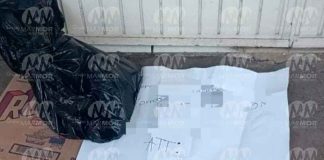 Abandonan cabeza de cerdo con cartulina, frente a escuela de Uruapan