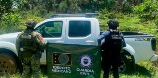 SSP y Defensa aseguran cargadores y municiones, en Apatzingán