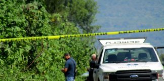 Localizan cuerpo putrefacto de una mujer en predio