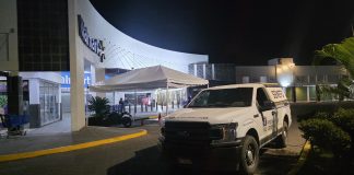 Solitario pistolero balea a empleado de Walmart y huye en un taxi