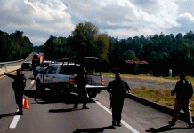 Localizan tres cuerpos calcinados a un costado de la Autopista de Occidente