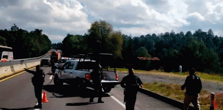 Localizan tres cuerpos calcinados a un costado de la Autopista de Occidente