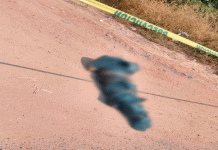Abandonan cadáver embolsado y baleado en la carretera Tepalcatepec -Buenavista