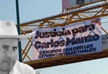 Colocan lona en puente peatonal de Morelia para exigir justicia por el asesinato de Carlos Manzo