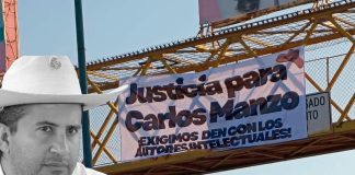 Colocan lona en puente peatonal de Morelia para exigir justicia por el asesinato de Carlos Manzo