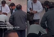 #VIDEO// Polémica previa al Aniversario de la Constitución por imagen de mujer limpiando zapatos a ministro de la SCJN