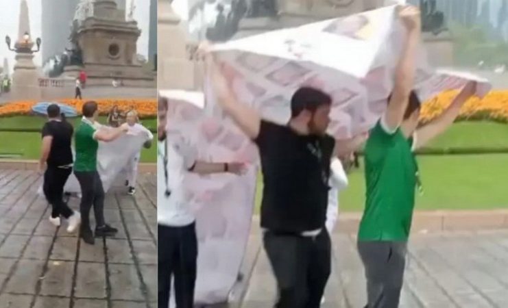 De la fiesta a la polémica: aficionados desatan críticas por usar lona de desaparecidos como paraguas
