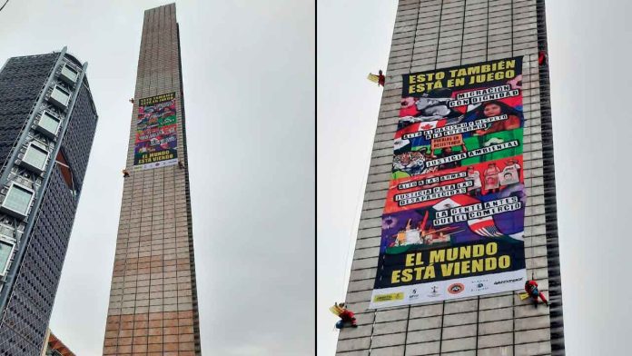 greenpeace-estela-luz-lona-protestas-mundial-2026-cdmx