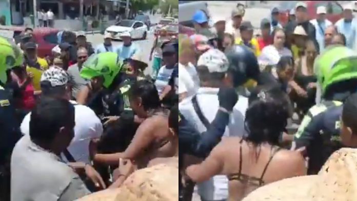 Turistas enfrentan a hombre señalado por presunto abus0 a menores