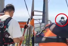 #VIDEO // ¡Abrió la puerta y se lanzó! Video muestra un inesperado momento en una torre de China