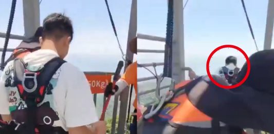 #VIDEO // ¡Abrió la puerta y se lanzó! Video muestra un inesperado momento en una torre de China