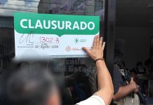 Clausuran anexo en Guadalajara tras hallar mas de 1,220,000 pesos y un arsenal de armas