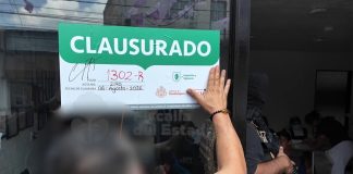 Clausuran anexo en Guadalajara tras hallar mas de 1,220,000 pesos y un arsenal de armas
