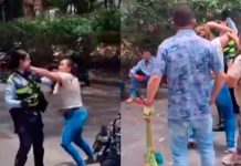 #VIDEO // Mujer y agente de tránsito protagonizan pelea a las afueras de una clínica en Colombia