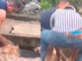 #VIDEO // Rescatan a niña arrastrada por la corriente hacia una alcantarilla en El Salvador
