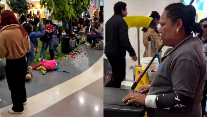 Empleada de limpieza con lágrimas en los ojos tras observar el desorden, pétalos y basura dejada por una celebración en un centro comercial.