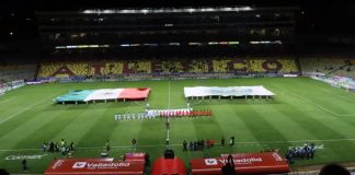 Ejército Mexicano celebra 60 años del Plan DN-III-E en estadio Morelos Elementos del Ejército Mexicano y la Guardia Nacional despliegan una bandera monumental en el estadio Morelos de Morelia.