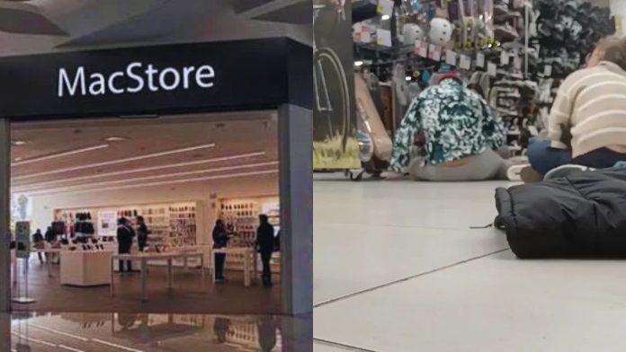 Clientes resguardándose en el suelo del centro comercial Vía San Ángel en Cholula durante el asalto armado a una tienda MacStore.