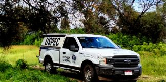 Localizan a hombre decapitado y con narcoletrero en carretera de Zinapécuaro