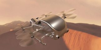 ¿Quieres viajar a Titán? La NASA abre registro para que vayas a su misión Dragonfly Helicóptero Dragonfly de la NASA explorando la superficie de Titán, la luna de Saturno.